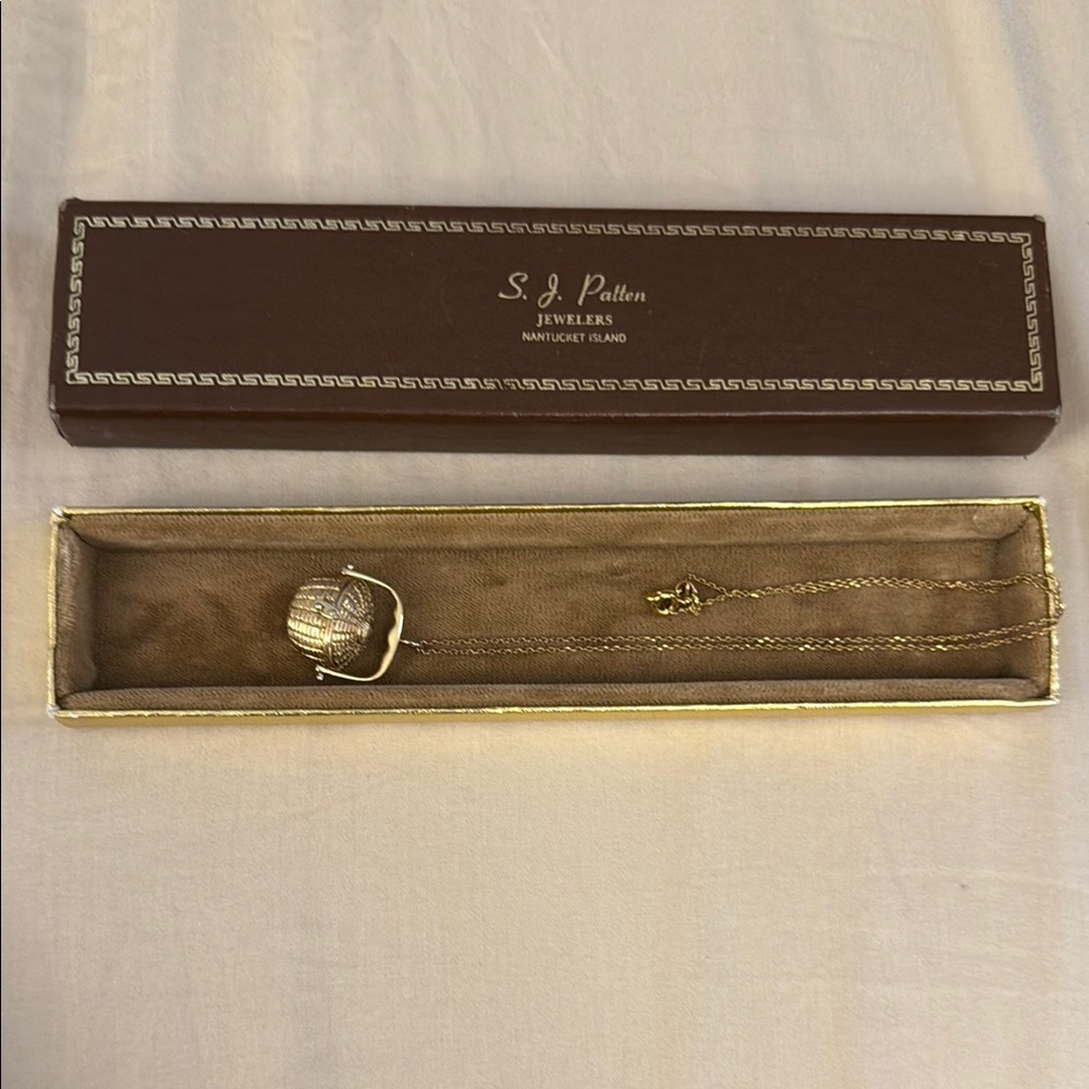 Golden Basket Nantucket Necklace with box from “S.J. Patten Jewelers Nantucket”
